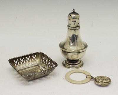 Lot 122 - Early 20th Century silver sugar caster, square bon bon dish and child's teething rattle