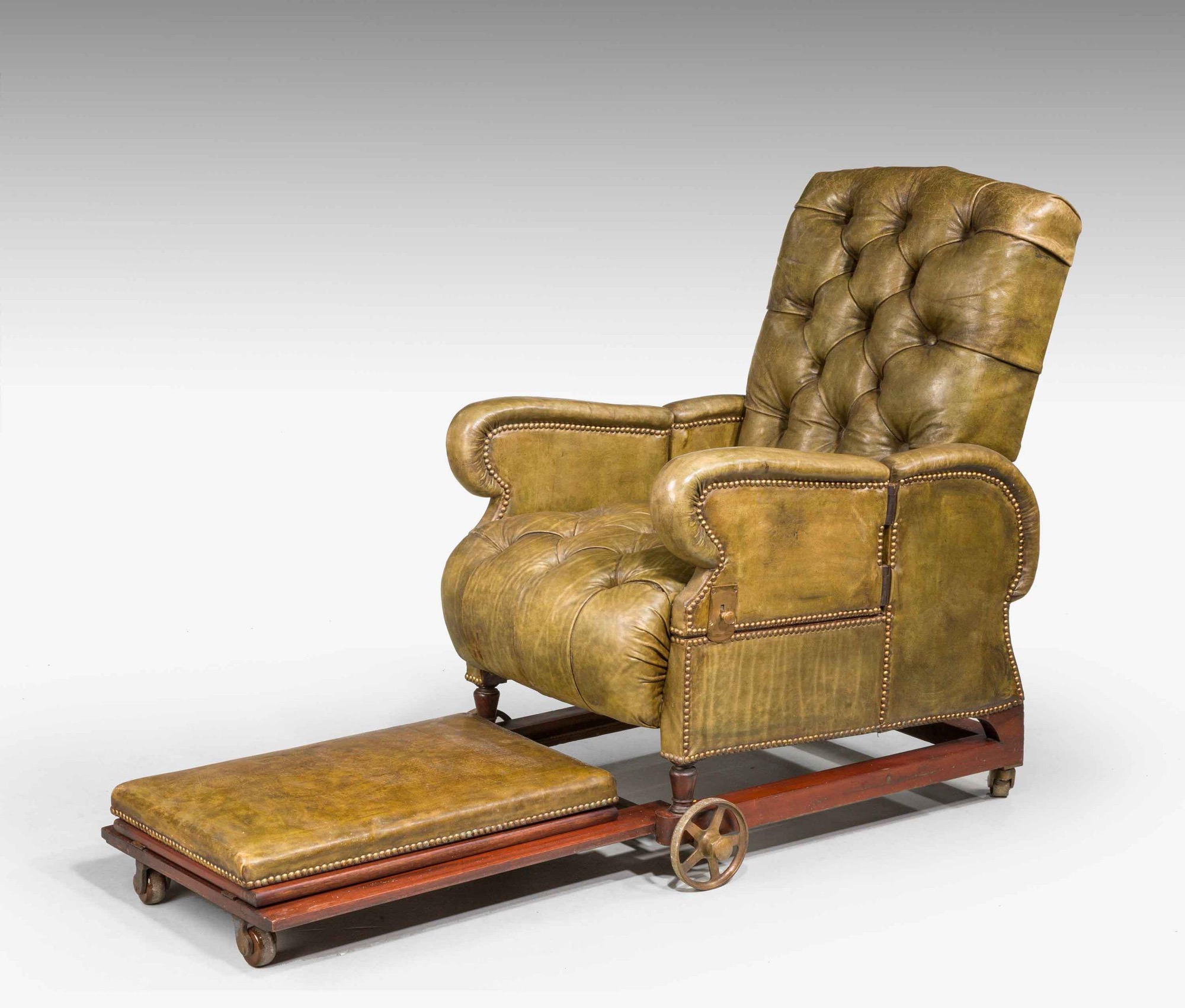 Lot 594 - Victorian invalid chair, deep-buttoned green