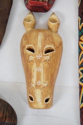 Lot 242 - Collection of African and other tribal masks