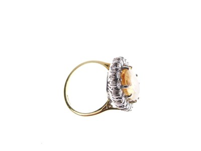 Lot 9 - Topaz and diamond cluster ring