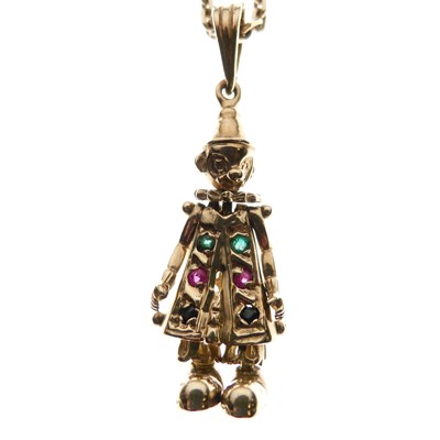 Lot 43 - Yellow metal articulated Pierrot pendant with 9ct gold chain