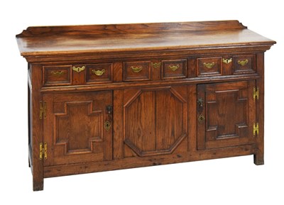 Lot 548 - Late 17th Century style oak geometric low dresser