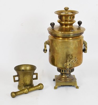 Lot 251 - Russian brass samovar, together with a mortar and pestle