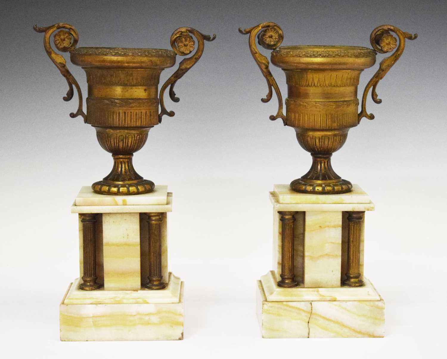 Lot 380 - Pair of late 19th Century French gilt metal and onyx urns