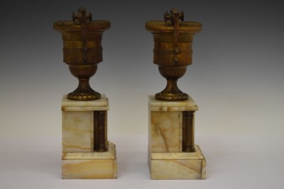 Lot 380 - Pair of late 19th Century French gilt metal and onyx urns