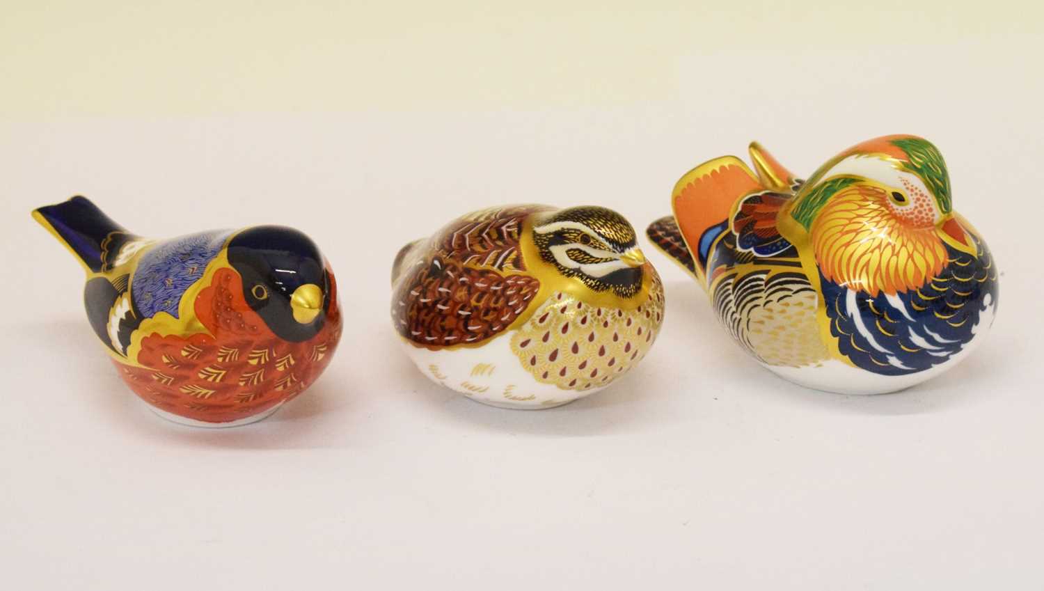 Lot 350 - Three Royal Crown Derby bird paperweights