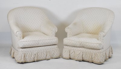 Lot 424 - Pair of cream upholstered tub armchairs