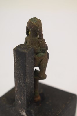 Lot 142 - Cast bronze pipe tamper of a woman