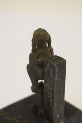 Lot 142 - Cast bronze pipe tamper of a woman