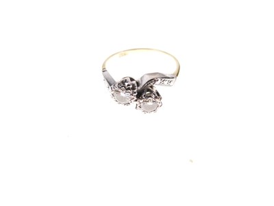 Lot 5 - Diamond two-stone crossover ring