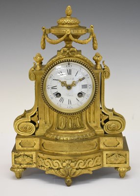 Lot 451 - 19th Century French brass ormolu mantel clock with urn finial