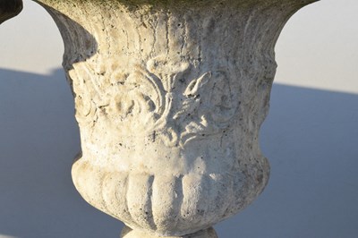 Lot 601 - Pair of composite stone pedestal planters