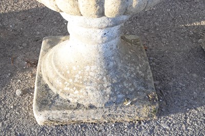 Lot 601 - Pair of composite stone pedestal planters