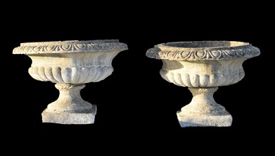 Lot 603 - Pair of composite stone low pedestal planters