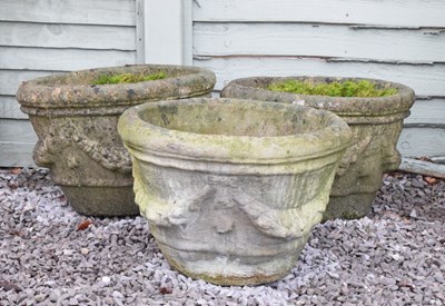 Lot 568 - Three composite stone garden planters