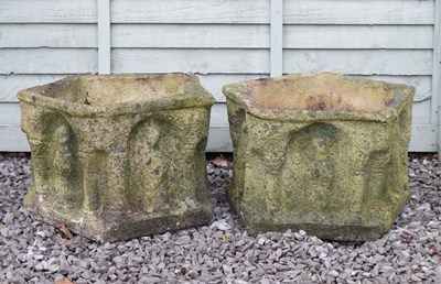 Lot 555 - Pair of composite stone pentagon garden planters with figural decoration