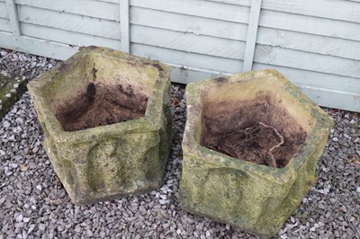 Lot 555 - Pair of composite stone pentagon garden planters with figural decoration