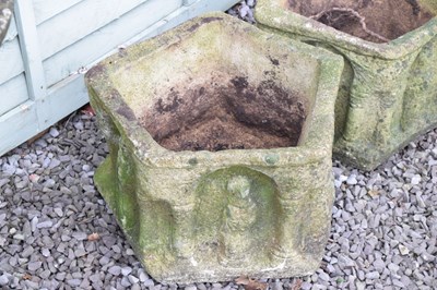 Lot 555 - Pair of composite stone pentagon garden planters with figural decoration