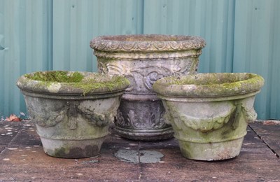 Lot 565 - Pair of composite stone garden planters, together with a larger planter