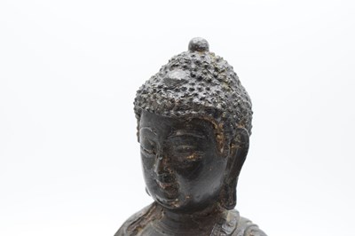 Lot 342 - Chinese or Tibetan bronze figure of the Buddha Shakyamuni