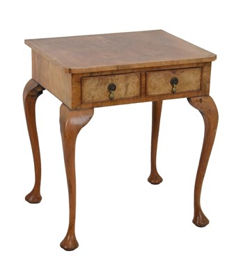 Lot 624 - Early 20th Century walnut two-drawer table