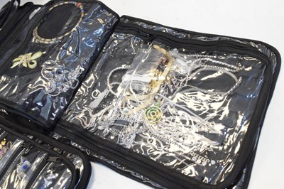 Lot 97 - Two black cloth pouches containing assorted silver and white metal jewellery