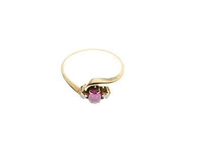 Lot 13 - 18ct gold, ruby and diamond three-stone ring