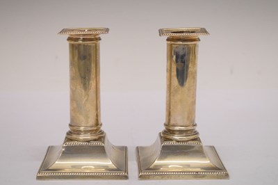 Lot 81 - Pair of George V silver candlesticks