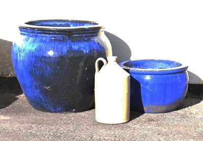 Lot 561 - Two blue glazed garden planters and glazed bottle/ jug