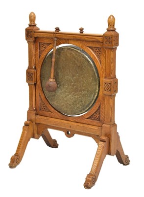 Lot 579 - Gothic oak framed dinner gong