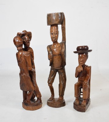 Lot 488 - Three carved wooden figures