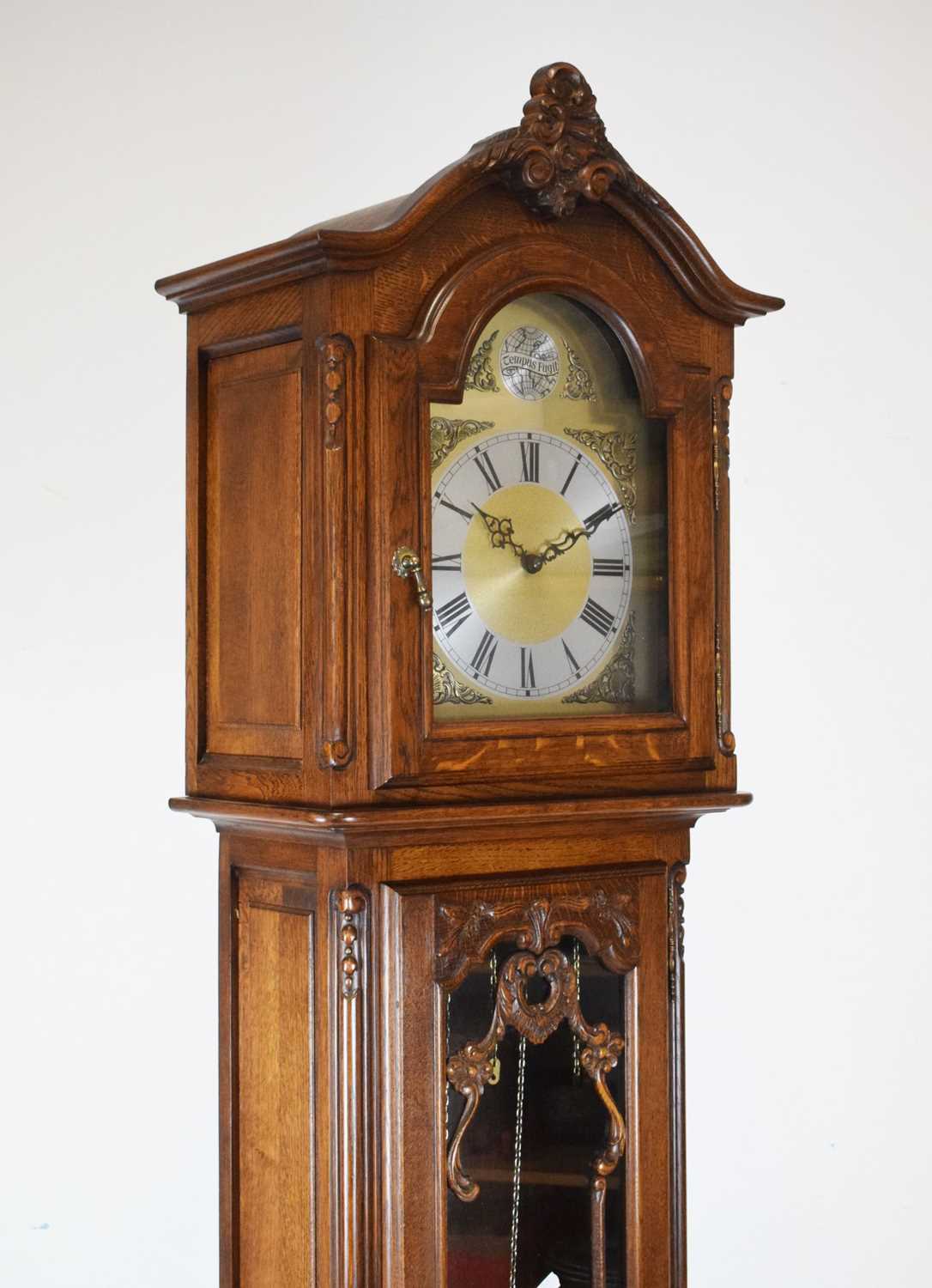 Lot 433 - Reproduction oak longcase clock