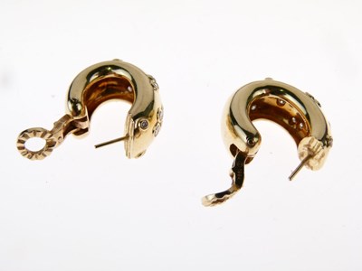 Lot 22 - Cartier - Pair of diamond set hoop earrings