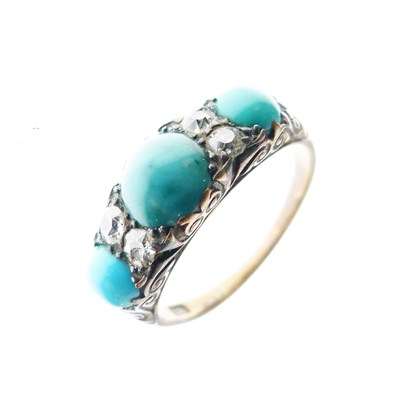 Lot 15 - Dress ring set three graduated turquoise cabochons and four old-cut diamonds