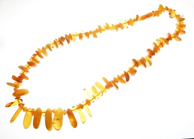 Lot 64 - Row of amber beads