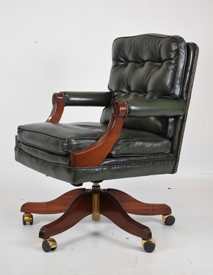 Lot 472 - Modern revolving desk chair