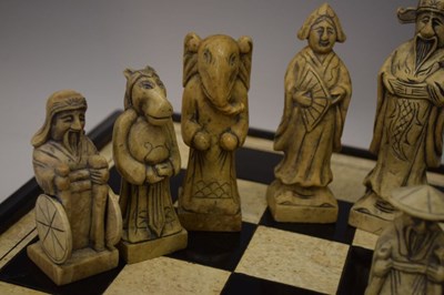 Lot 576 - Soapstone chess set and board