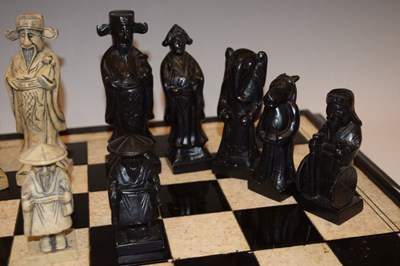 Lot 576 - Soapstone chess set and board