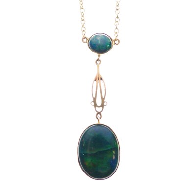 Lot 55 - 9ct yellow metal and black opal pendant with necklace
