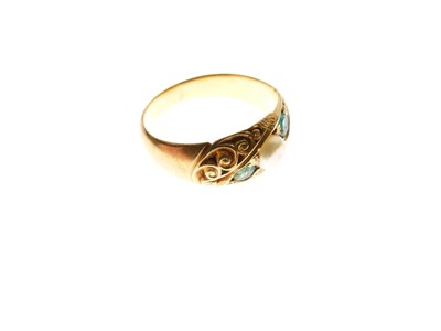 Lot 12 - Unmarked yellow metal ring set emeralds and pearl