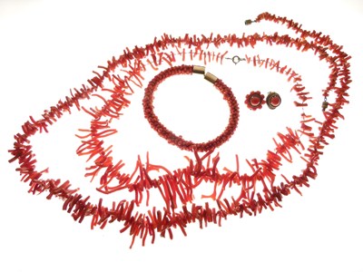 Lot 100 - Two fringed coral necklaces, coral bracelet, and pair of ear clips