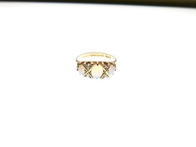 Lot 15 - Edwardian 18ct gold ring set three opals and rose cut diamonds