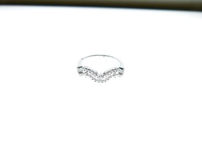 Lot 11 - 18ct white gold diamond set dress ring