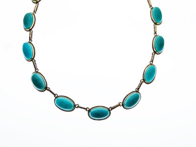 Lot 67 - '9c' yellow metal and turquoise cabochon necklace