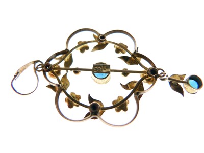 Lot 53 - Edwardian '9ct' yellow metal pendant with blue stones
