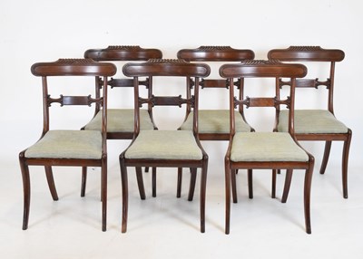 Lot 545 - Set of six George IV mahogany sabre-leg dining chairs