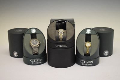 Lot 130 - Citizen Eco-Drive - Gentleman's Titanium stainless steel wristwatch and two lady’s watches