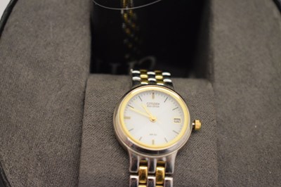 Lot 130 - Citizen Eco-Drive - Gentleman's Titanium stainless steel wristwatch and two lady’s watches