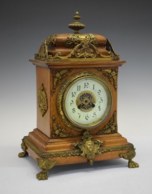 Lot 598 - Late 19th/ early 20th Century oak mantel clock