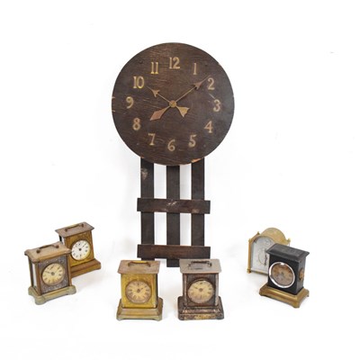 Lot 611 - American Arts & Crafts wall clock, plus musical alarm clocks